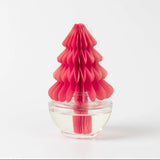 Pink honeycomb-shaped diffuser on a white background
