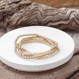 White + Worn Gold Bracelet Stack