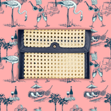 Woven clutch bag on a pink background with vintage-style illustrations