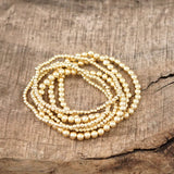 Gold Tone Multi Size Beaded Bracelet Stack - set of 6