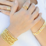 3mm Bead with 5mm accent Gold Stretch Bracelets