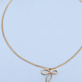 Pearl Embellished Bow Pendant Necklace