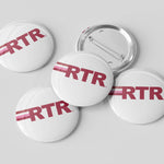 Five round pin-back buttons with a glossy white surface, featuring the red letters 'RTR' with two thin red stripes, shown on a light gray background. One button is turned over to show the silver metal pin-back mechanism.