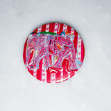 Colorful coaster with elephant design on a white background
