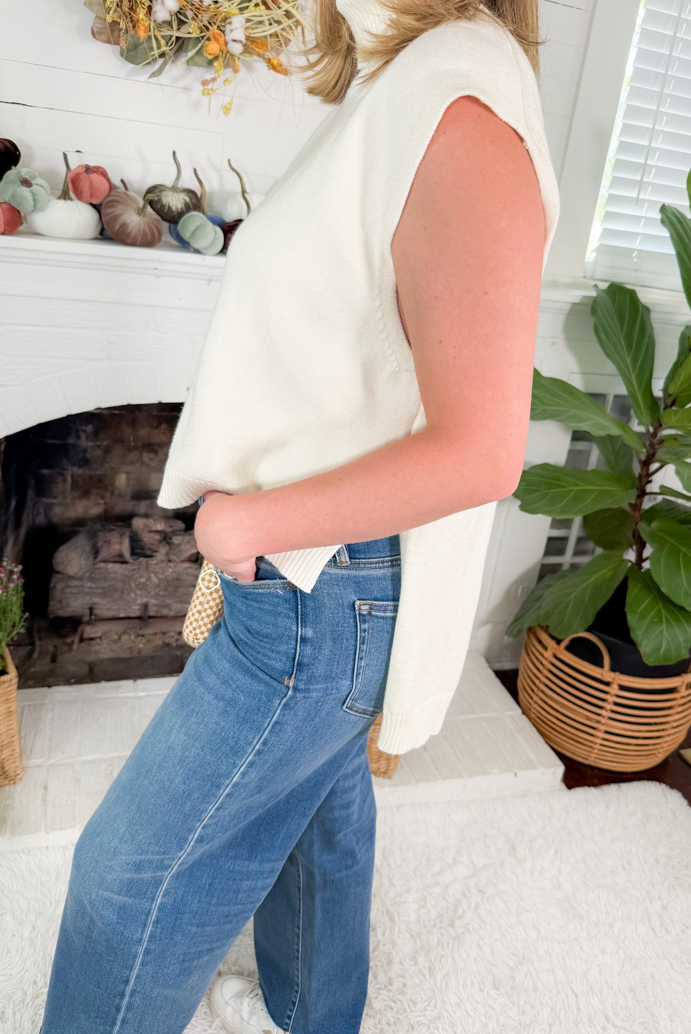 Buster Ivory Sleeveless Turtleneck Hi - Lo Sweater Karlie
