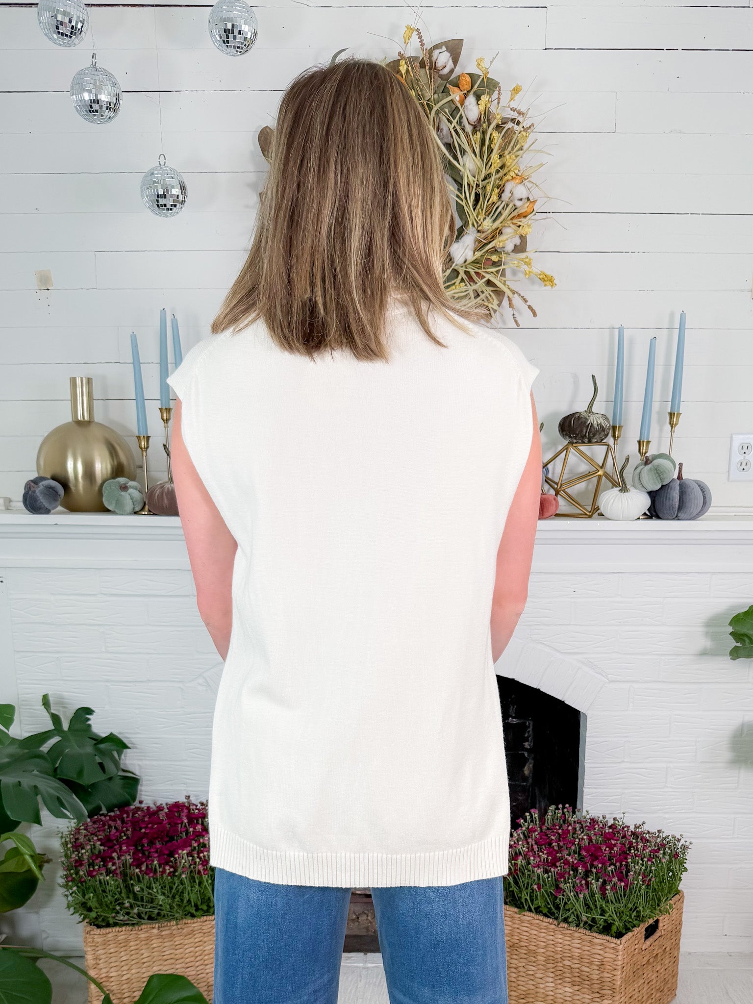 Buster Ivory Sleeveless Turtleneck Hi - Lo Sweater Karlie
