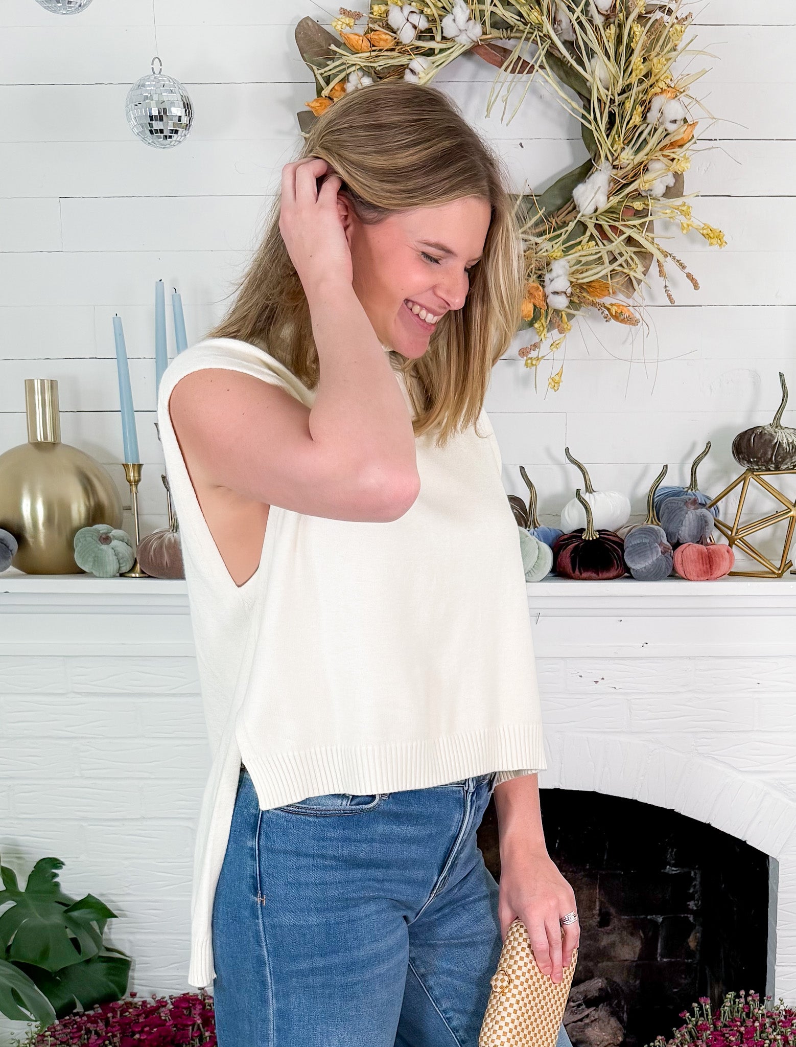 Buster Ivory Sleeveless Turtleneck Hi - Lo Sweater Karlie