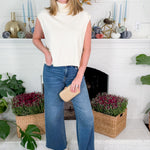 Buster Ivory Sleeveless Turtleneck Hi - Lo Sweater Karlie