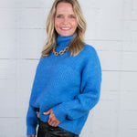 Covington Blue Turtleneck Sweater Molly Bracken