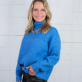 Covington Blue Turtleneck Sweater Molly Bracken