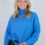 Covington Blue Turtleneck Sweater Molly Bracken