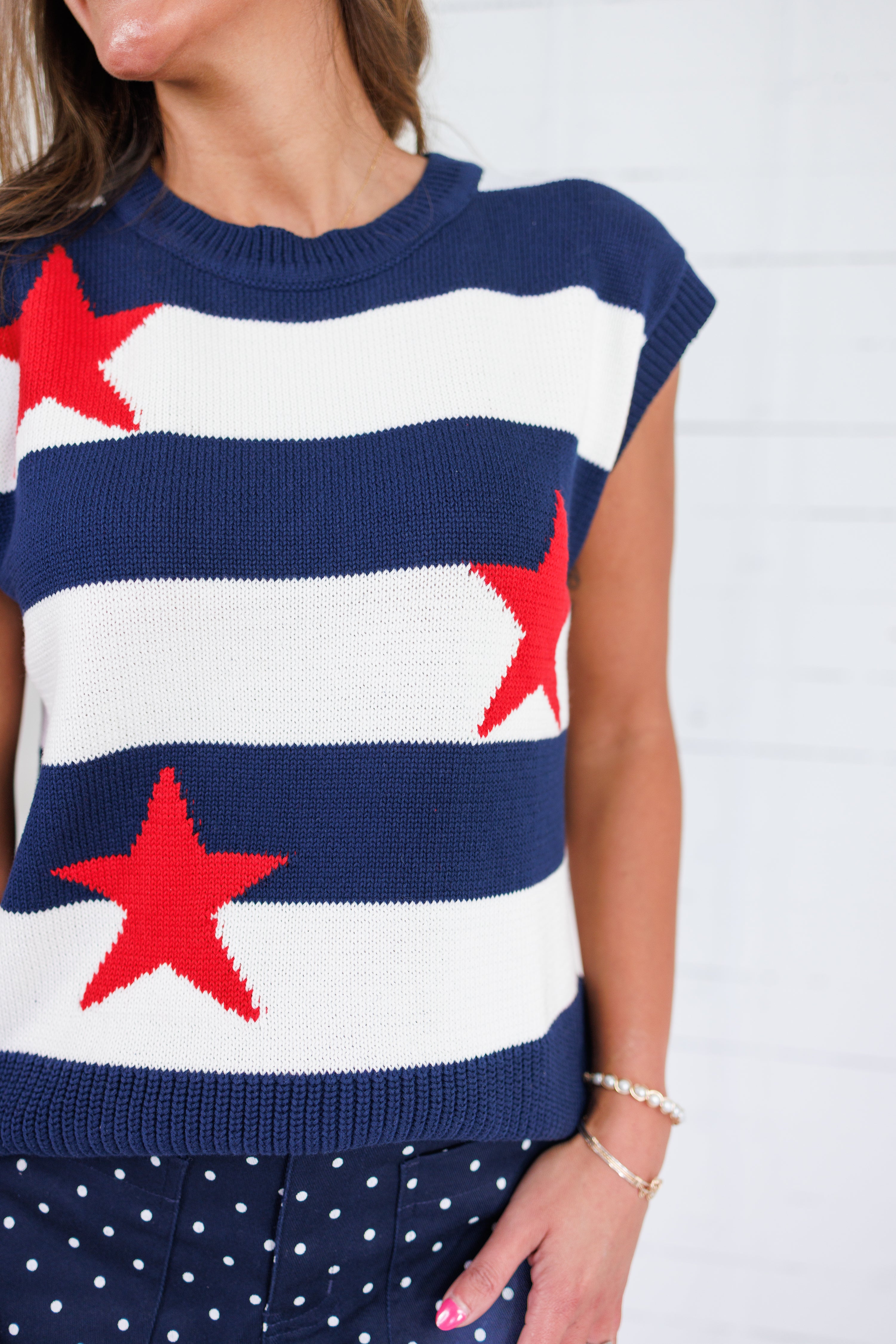 Home of the Brave Sleeveless Sweater Skies are Blue