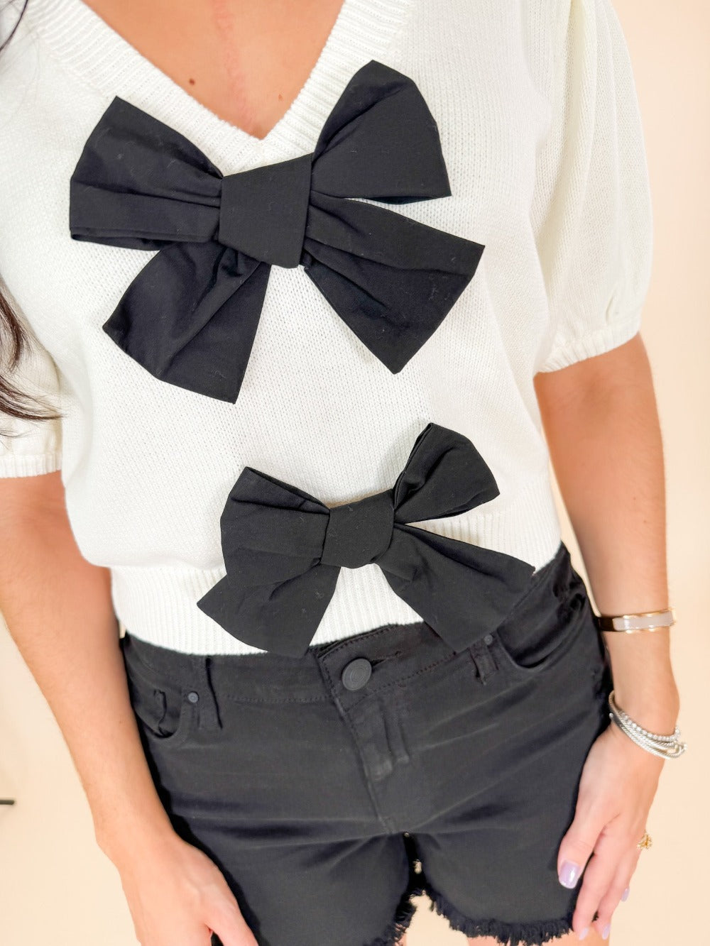 black bow front sweater