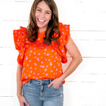 orange with pink spot top thml brand