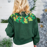 Queen of Sparkles Wreath Around Neck Green Sweater