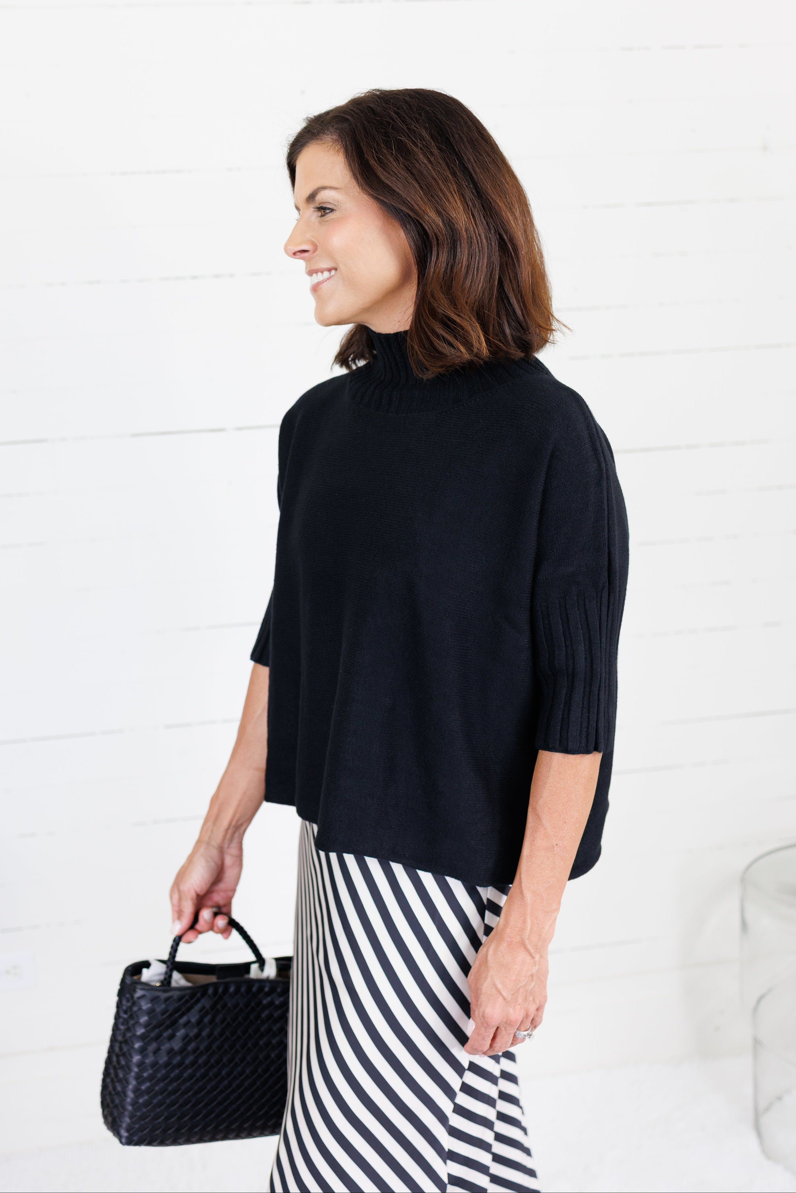 The Maple Black Turtleneck Sweater Rain + Rose