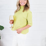 The Maple Lime Turtleneck Sweater Rain + Rose