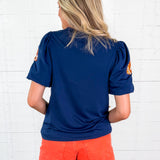 Tina Navy + Orange Footballs Top Mary Square