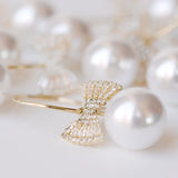 Bow Tie Pearl Earrings