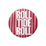 A circular button or badge featuring a red and white striped pattern with the text 'ROLL TIDE ROLL' in bold white letters.