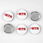 Six round pin-back buttons shown from front and back on a light gray background. The front buttons are white with red 'RTR' lettering and a thin red stripe, while the back buttons show the silver metal clasp.