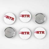 Six round pin-back buttons shown from front and back on a light gray background. The front buttons are white with red 'RTR' lettering and a thin red stripe, while the back buttons show the silver metal clasp.