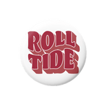 A round white button badge featuring the words 'ROLL TIDE' in bold red 3D-style lettering with white outlines, set against a plain white background.