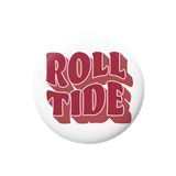 A round white button badge featuring the words 'ROLL TIDE' in bold red 3D-style lettering with white outlines, set against a plain white background.