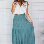 Angie Sage Eyelet Tiered + Smocked Waist Maxi Skirt