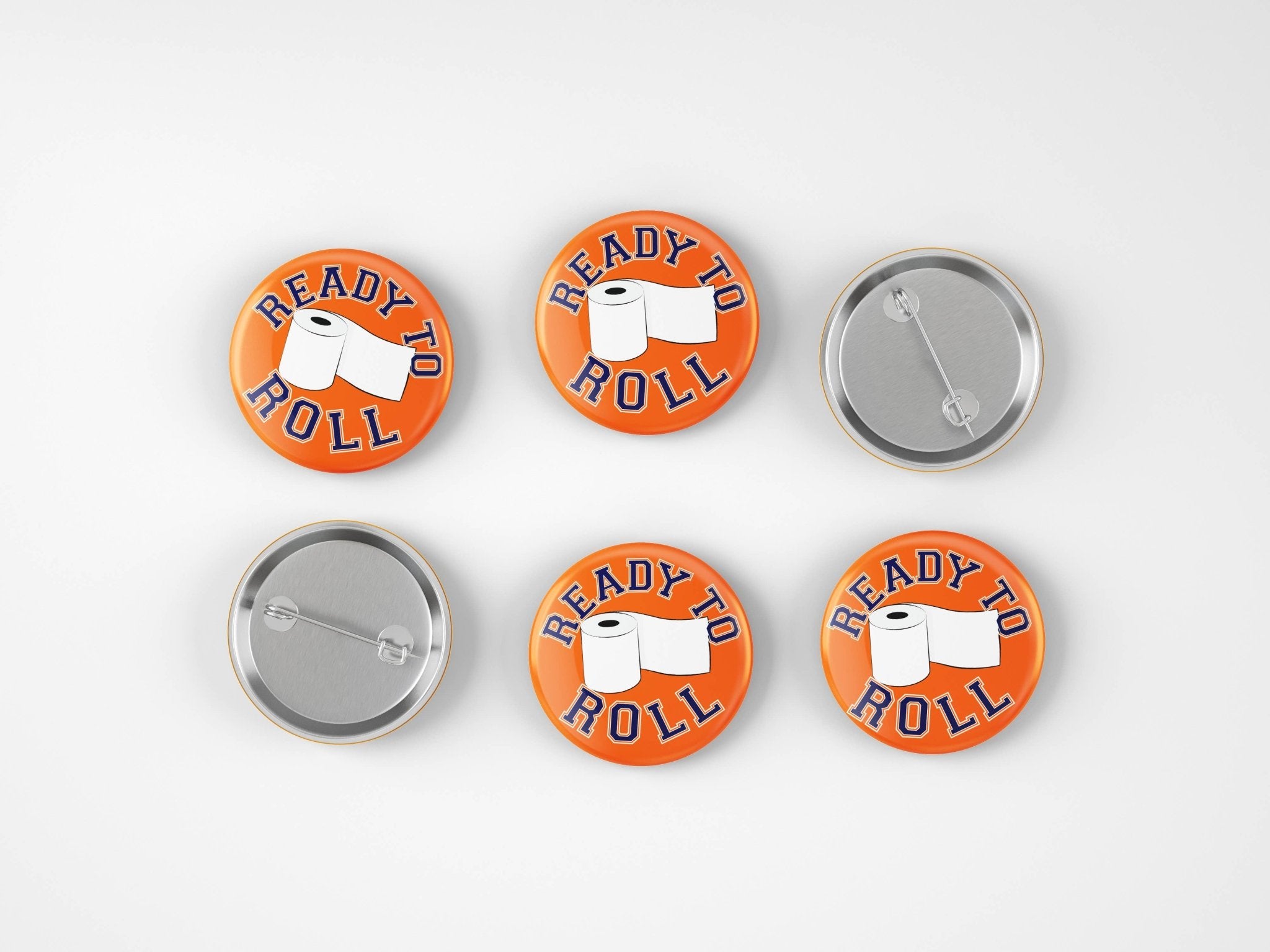Set of five buttons with 'Ready to Roll' text and toilet paper graphic on a white background
