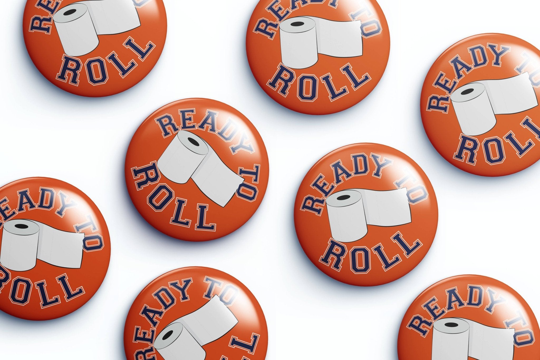 Collection of 'Ready to Roll' buttons with toilet paper graphics on an orange background.