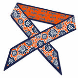 Headband with floral pattern and 'War Eagle' text on an orange and blue background
