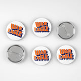 Six round pin-back buttons on a light gray background, showing both the front and back views. The front buttons feature the words 'WAR EAGLE' in orange with a blue outline, while the back buttons show the silver metal pin mechanism.