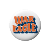 A round white button badge featuring the words 'WAR EAGLE' in orange letters with a dark blue shadow effect, centered on a plain white background.