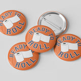Four orange buttons with a toilet paper graphic and 'Ready to Roll' text on a gray background.