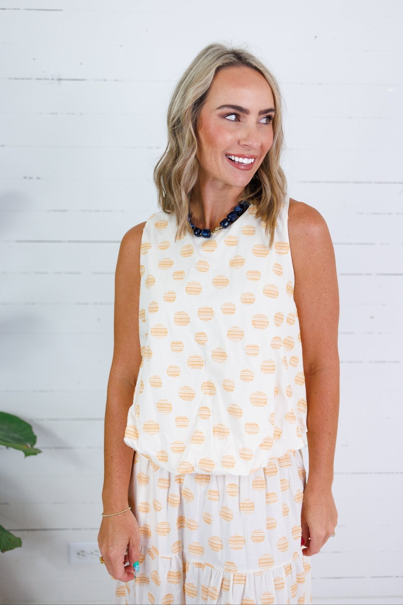Celeste Honey Drops Bubble Hem Top Adrienne