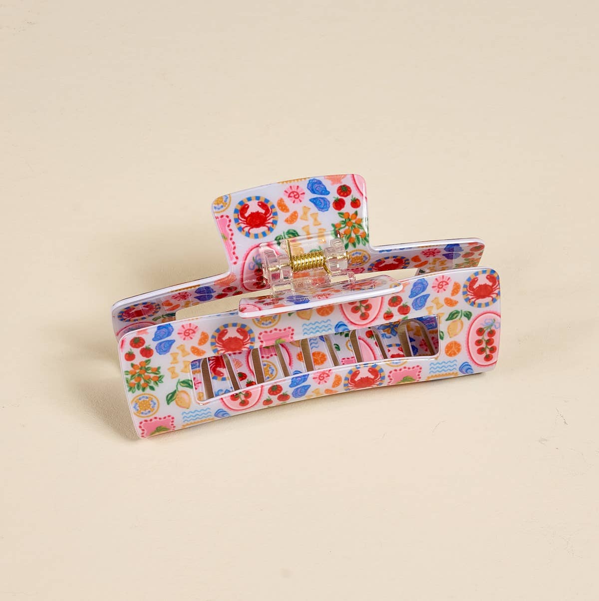 Colorful pencil case with a pattern on a beige background