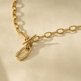 Open Front Gold Necklace With Hammered Oval Ring