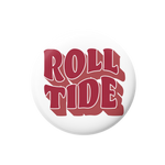 A round white button badge featuring the words 'ROLL TIDE' in bold red 3D-style lettering with white outlines, set against a plain white background.