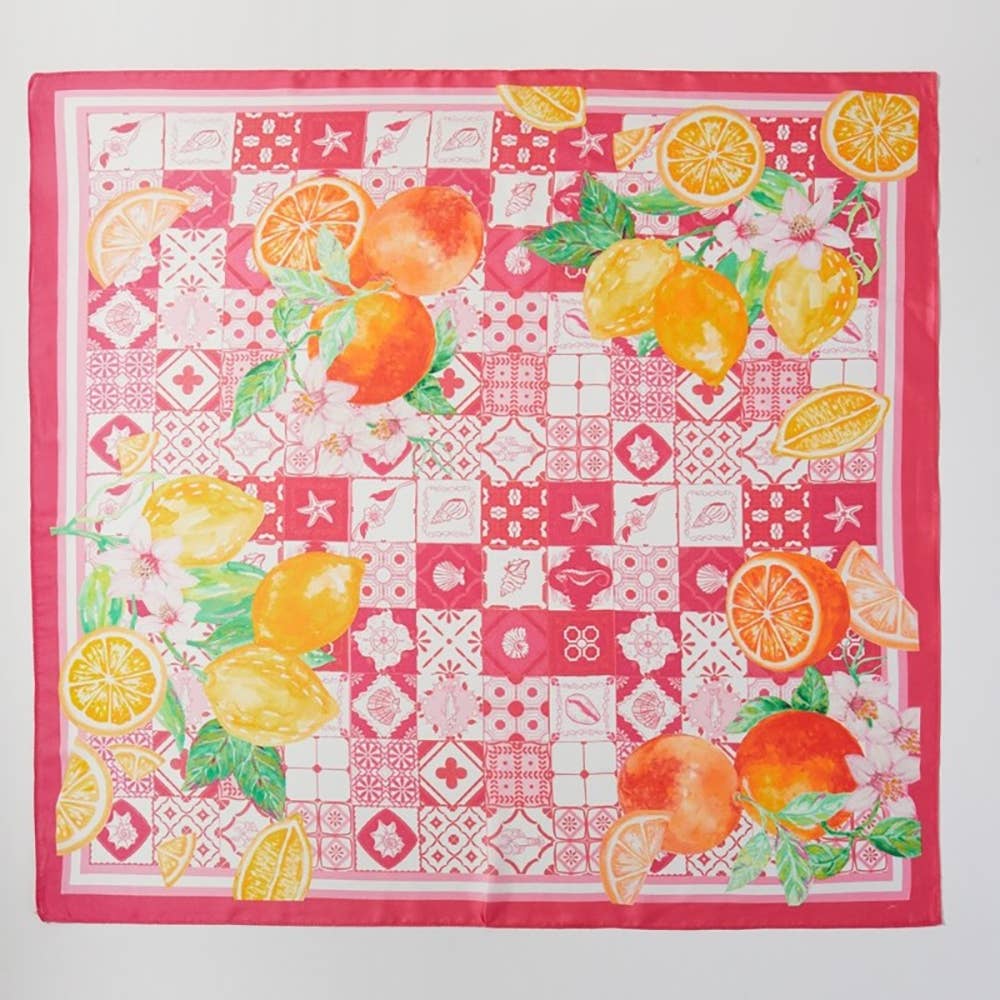 Pink fabric with orange and lemon pattern on a white background