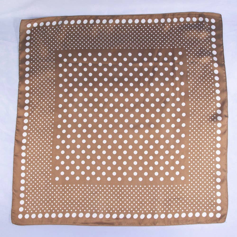 Brown fabric with white polka dot pattern on a white background