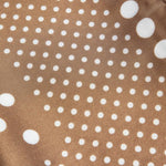 Brown fabric with white polka dots