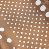 Brown fabric with white polka dots