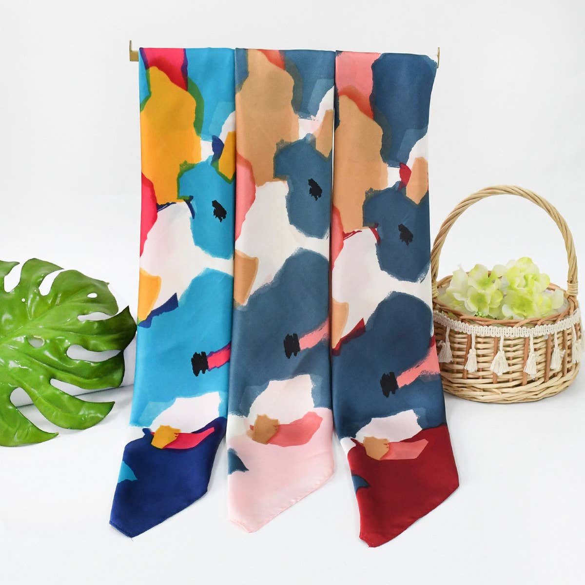 Colorful scarf with abstract patterns on a white background
