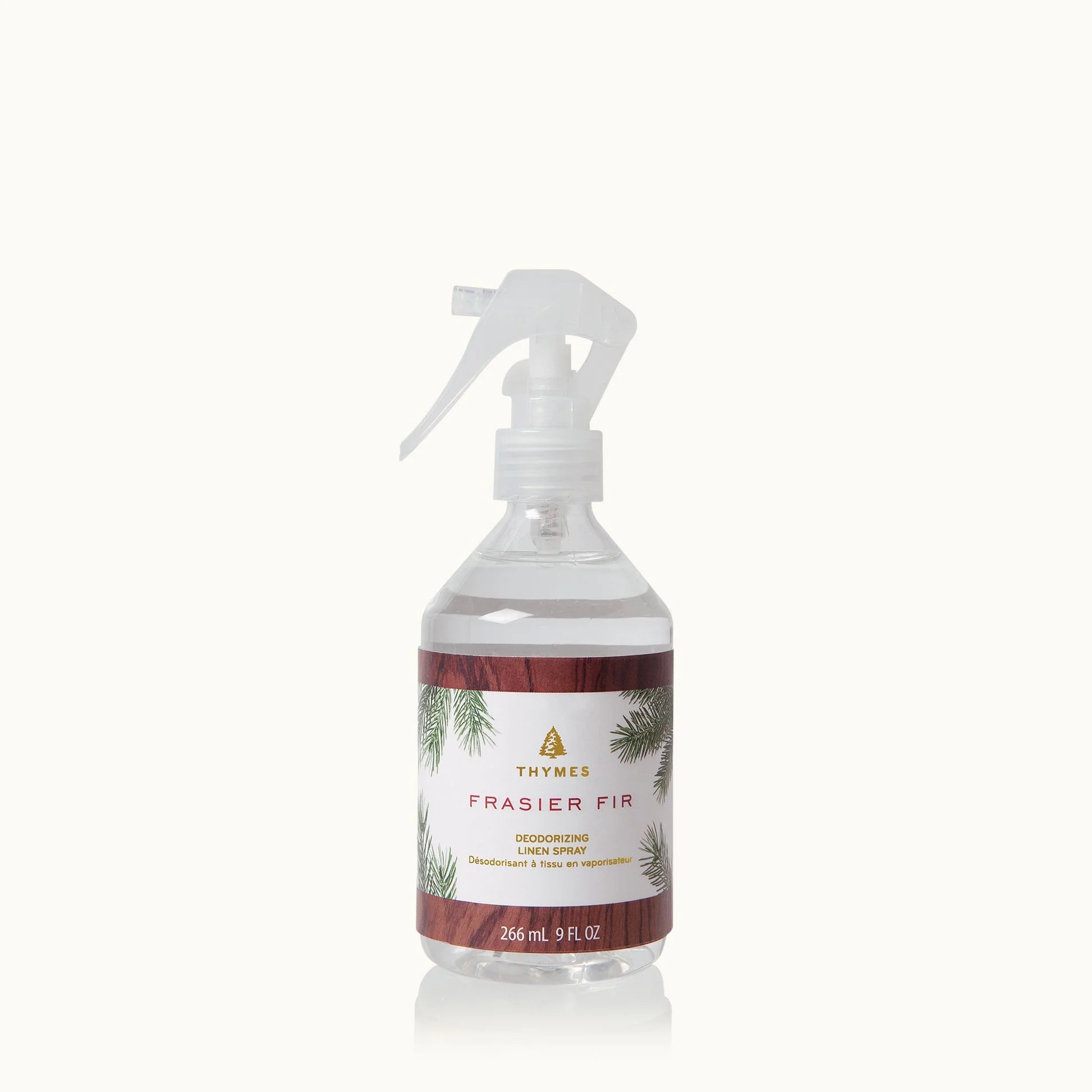 Thymes Frasier Fir room spray bottle on a white background